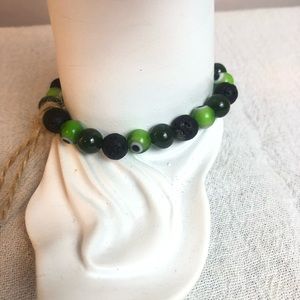 Handmade by: Kayk Green Evil eye, Jade, & Lavastone bracelet 6.25” stretchy #197